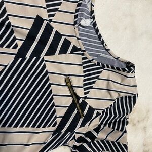 Geometric Striped Top with Zipper Accent